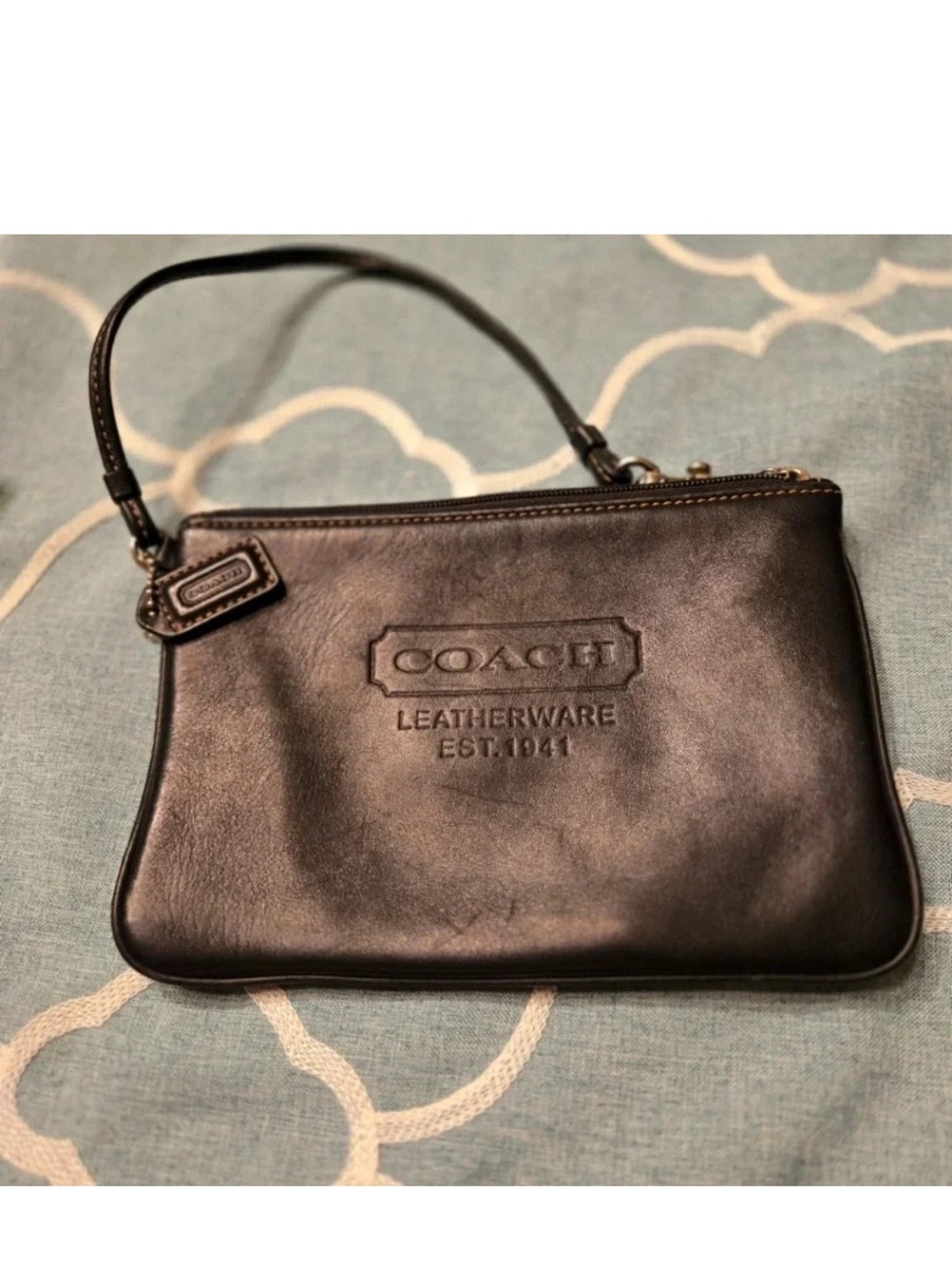 Coach Black Leather Wristlet Clutch with Embossed Logo
AG-07
